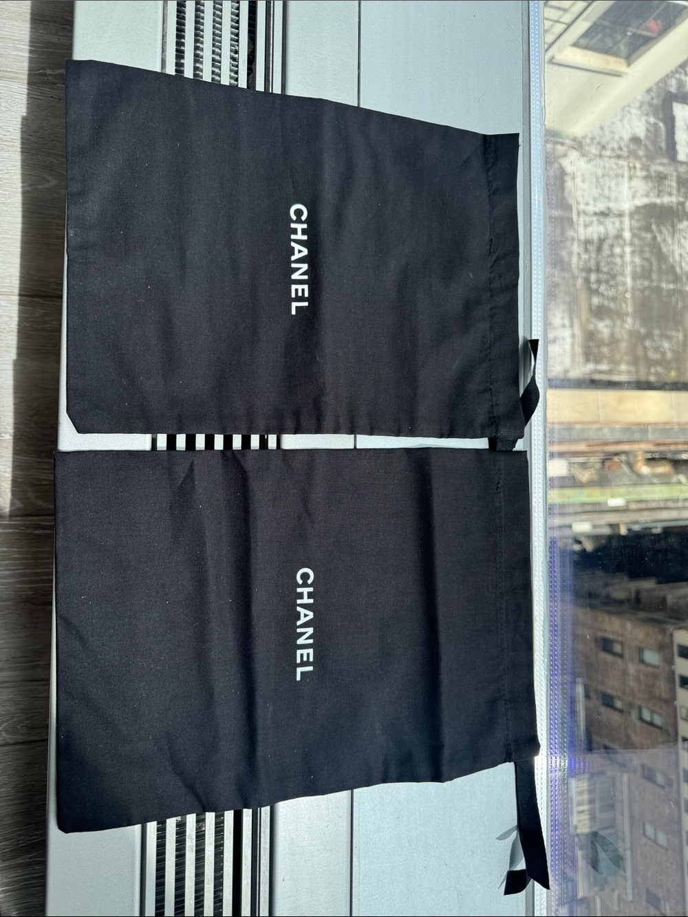CHANEL Black Dust Bag Pair with White Logo
